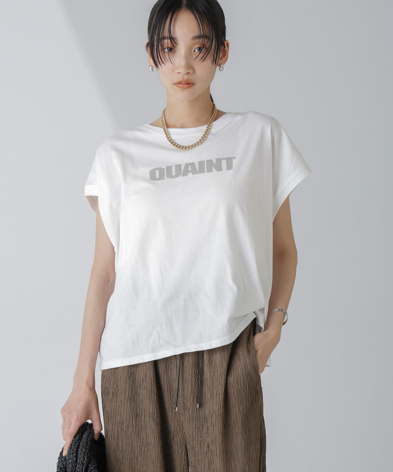 フロッキーロゴノースリーブクロップドトップス